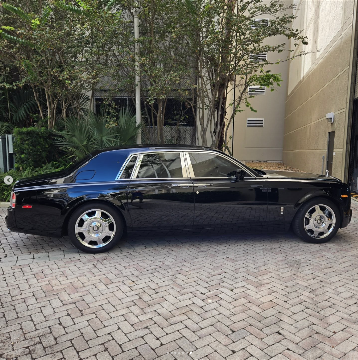 Black Rolls-Royce Phantom side profile after professional exterior detailing