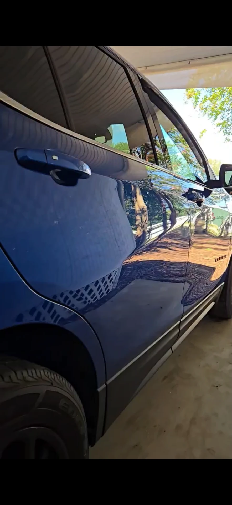 BLUE CHEVROLET EQUINOX SIDE PROFILE WITH DEEP GLOSS AFTER PAINT POLISHING